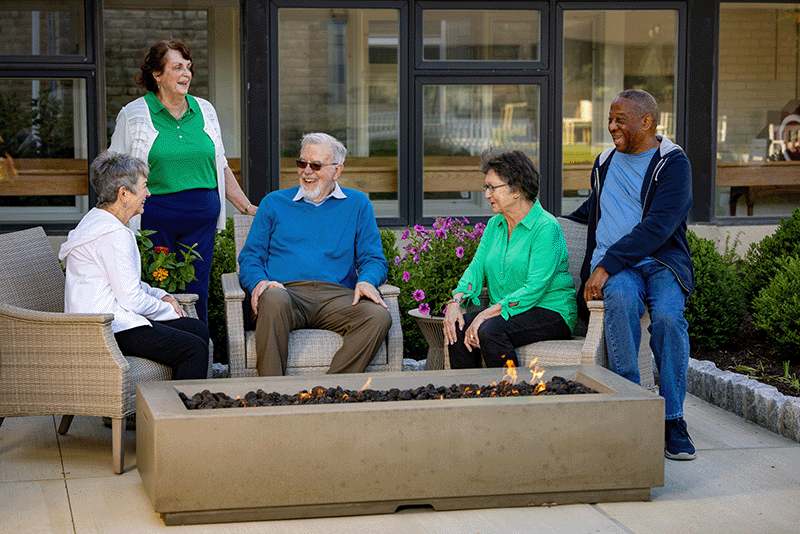 Residents By Fire Pit