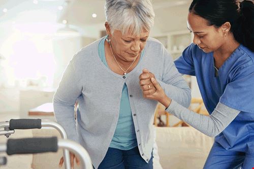 Skilled Care Nurse Helping With Recovery